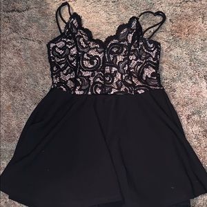 Lace top and black skirt romper